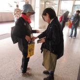 volunteer selling flag