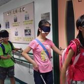 Blind-folded participants trying to walk