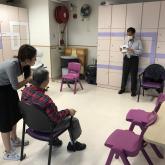 Optometrists conduct vision screening an elderly