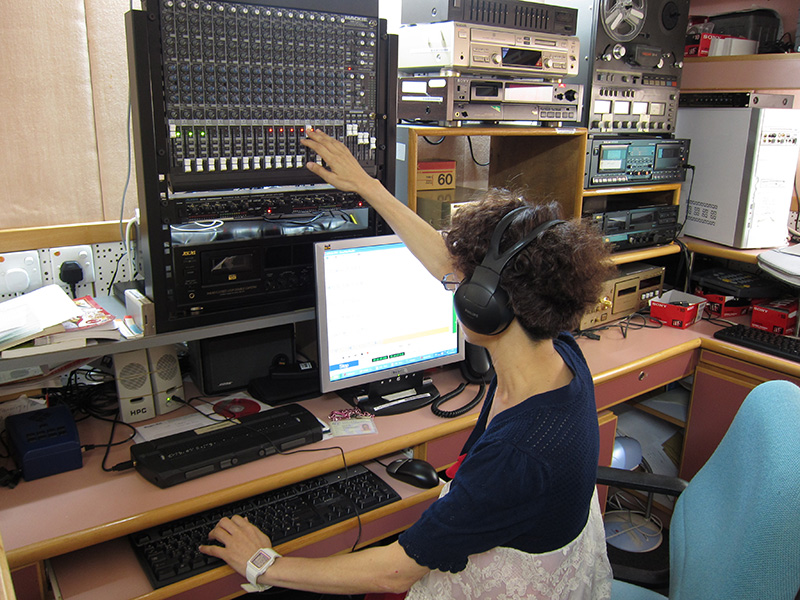 A volunteer helps to record talking books at our recording studio.