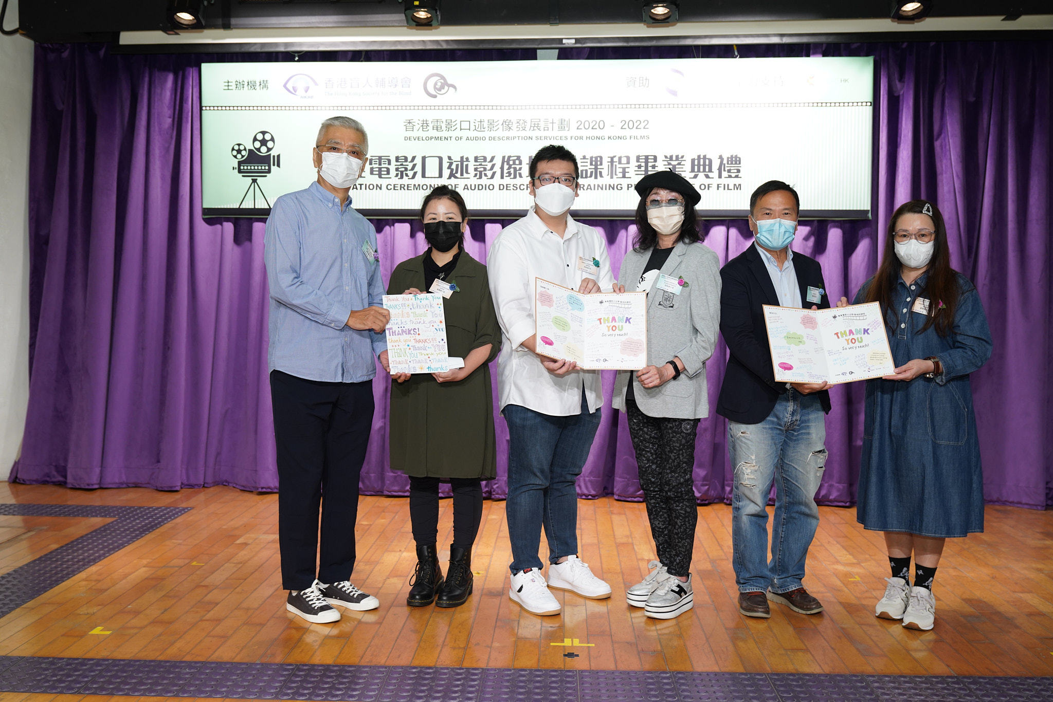 Graduate representatives presenting Thank You Cards to course instructors, Mr. Clarence Yang, Ms. Mabel Cheung and Mr. Thomas Shin