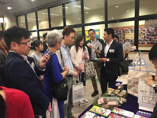 Guests visit our booth