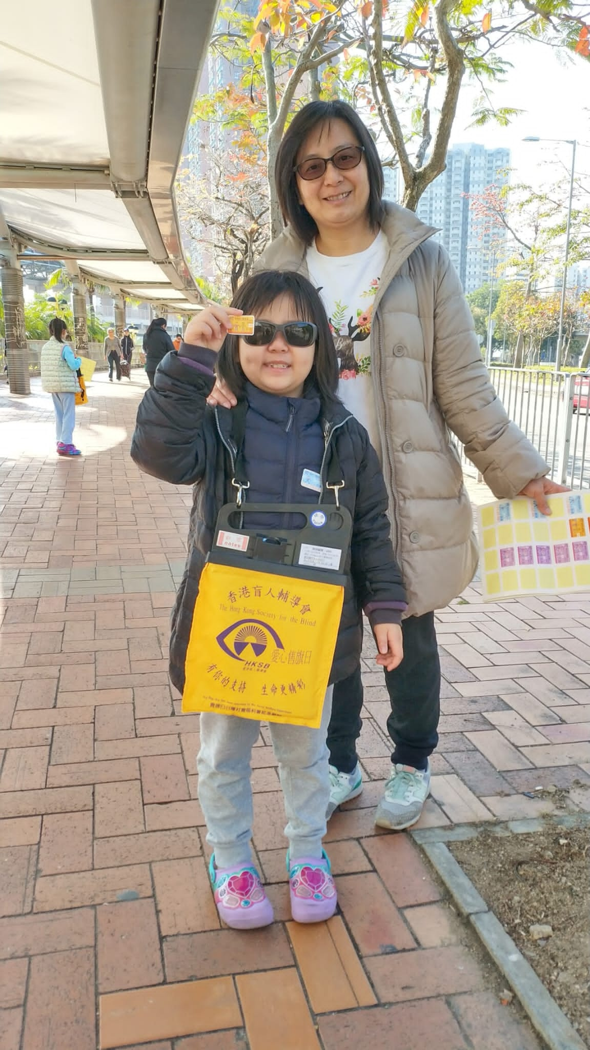 Anna and her mother helped at HKSB Flag Day