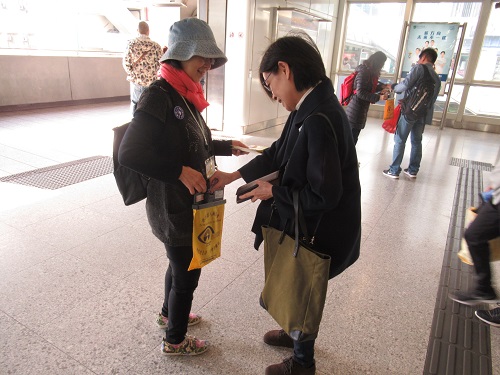 volunteer selling flag