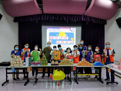 Volunteers are preparing the gift pack for home visits