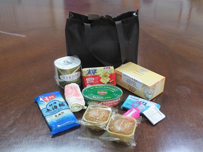 Each gift pack included a box of face mask, sanitizers, canned food, lantern and mooncakes.